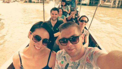 Group selfie on the floating market